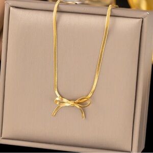 Brexly Boutique Ribbon Bow Choker Necklace in Gold